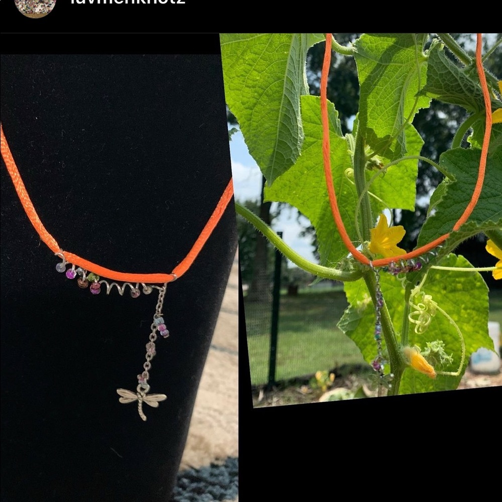 Orange silk/satin with fidget coil beads. Dragonfly charm